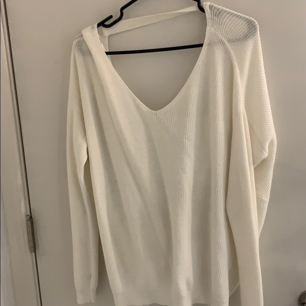 Cute open back knot sweater
